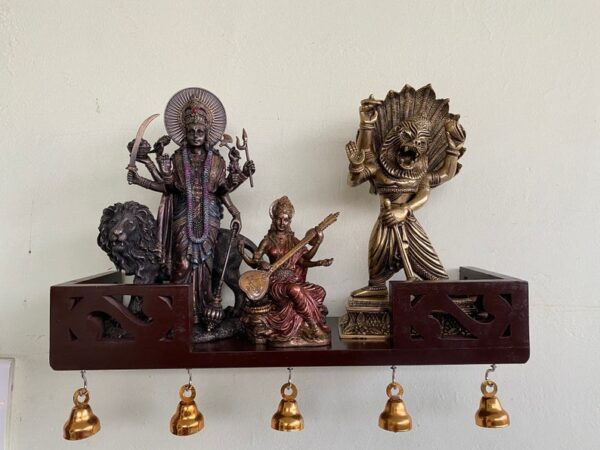Wooden wall shelf temple design for your home. Wooden temple for home