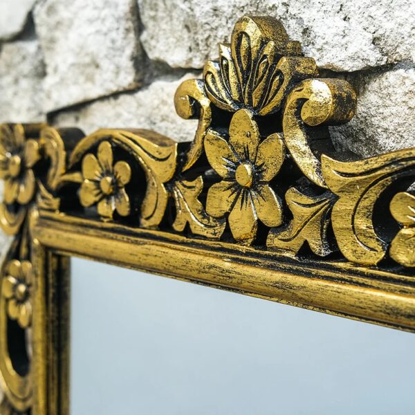 wooden carved mirror frame in antique gold panit by shalvika living innovations