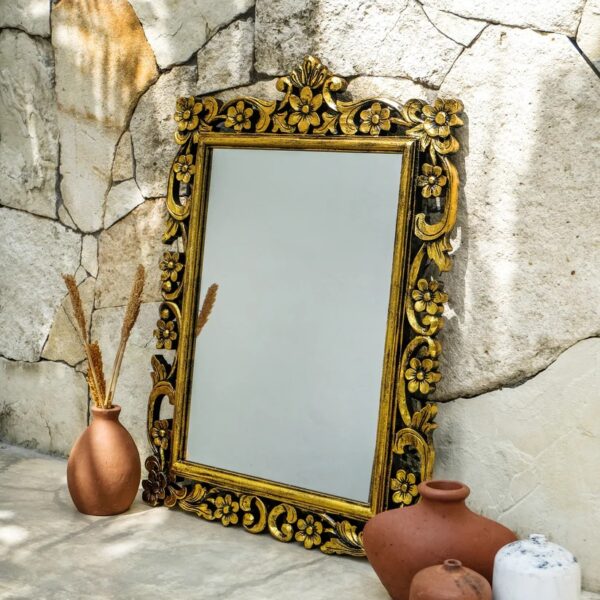 wooden carved mirror frame in antique gold panit by shalvika living innovations