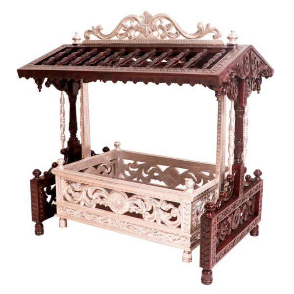 Traditional wooden baby cradle with metal coating in white polish