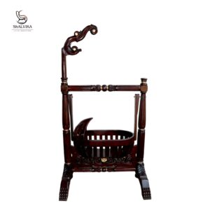 Handmade teak wood baby cradle with traditional design by Shalvika Living Innovations